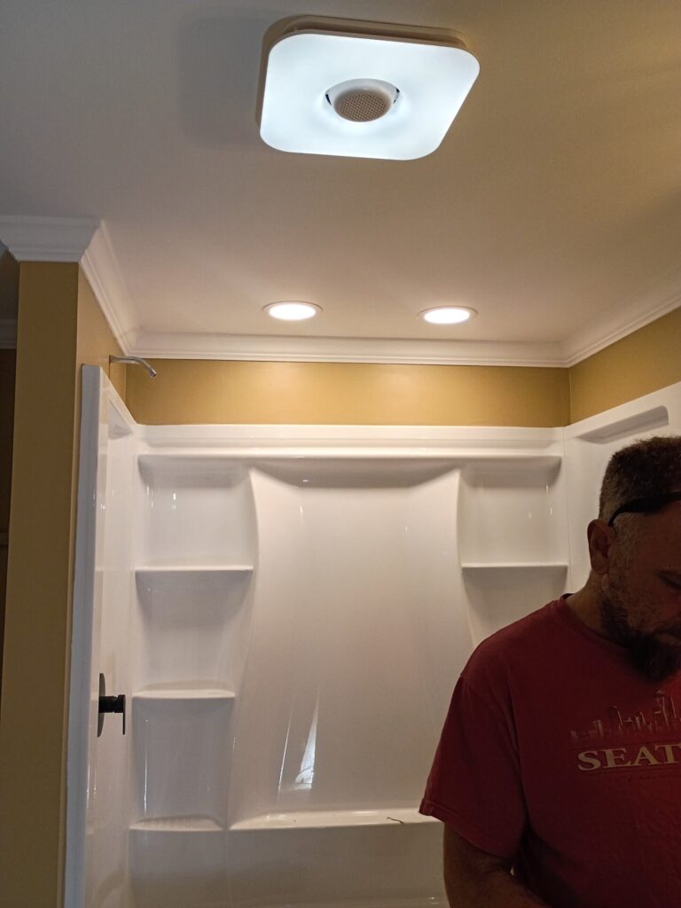 Recessed lighting above the shower