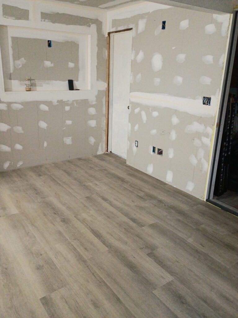 Flooring laid during the wall-finishing stage