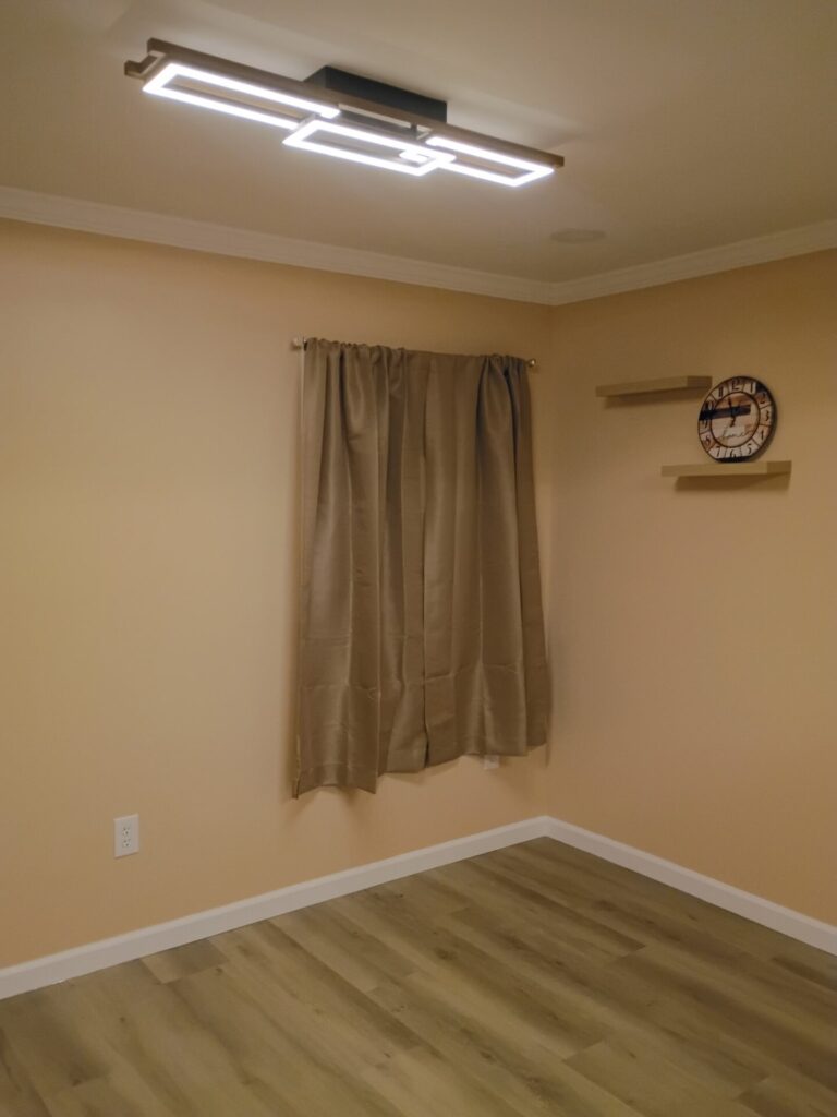 Living space with updated ceiling lighting